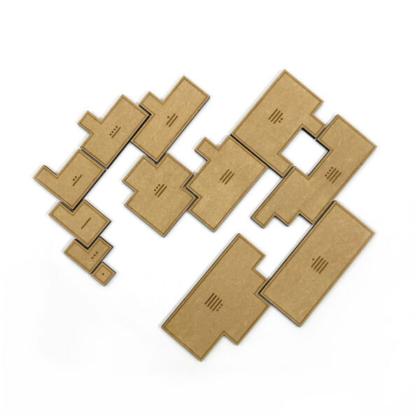 Alle houten polyominos uit de Enigmaya puzzel.